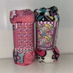Two hello kitty blankets